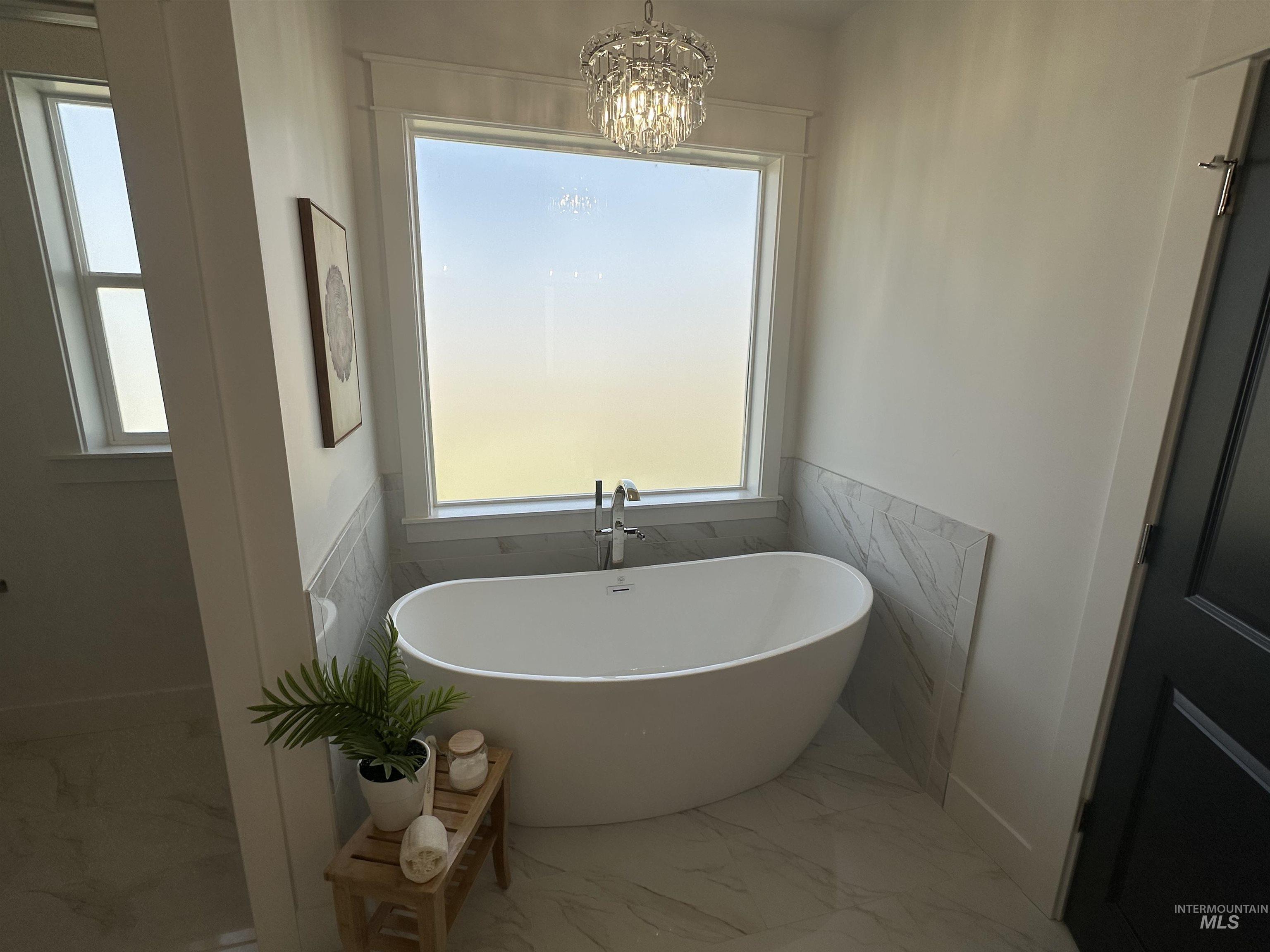3035 Lake View Twin Falls, ID 83301 - Photo 32 of 41 Double vanity featuring undermount sinks and quartz countertops