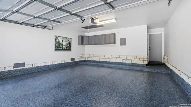 a view of water heater room with window