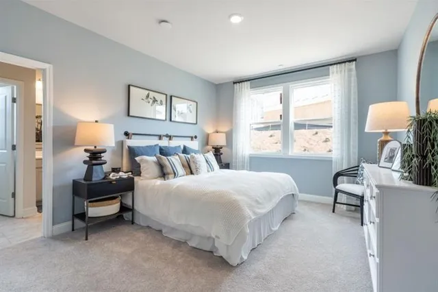 a bathroom with a double vanity sink mirror and shower