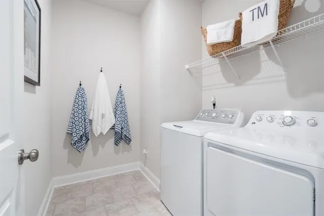 a outdoor space with a couch and chairs