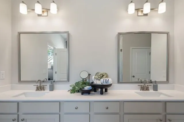 a white bath tub sitting next to a shower