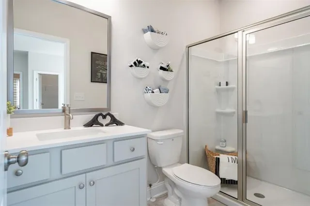 a bedroom with a bed and a table