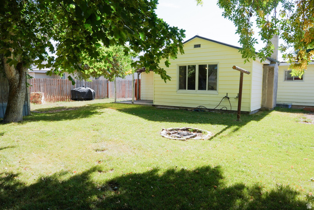 324 Stringtown Road Georgetown, ID 83239 - Photo 31 of 49 View of yard featuring a fire pit