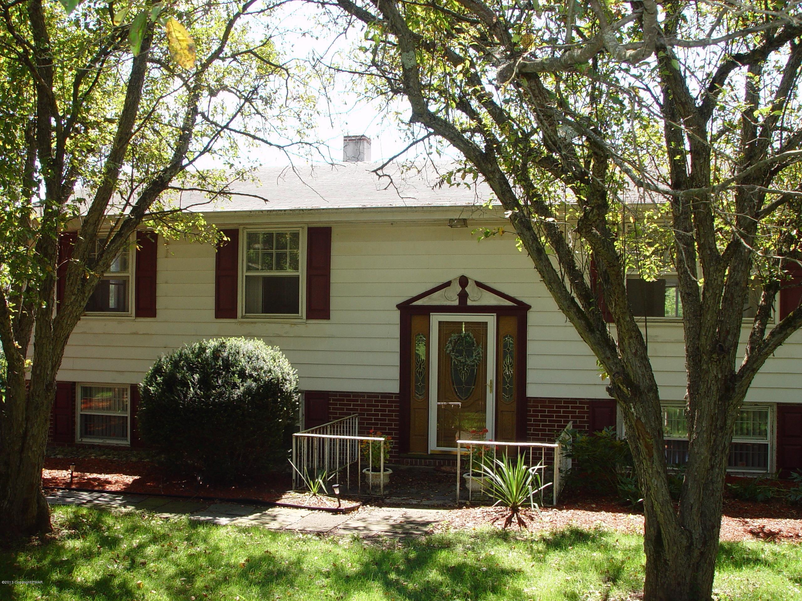 396 Good Times Road Kunkletown, PA 18058 - Photo 1 of 45 a front view of a house with yard