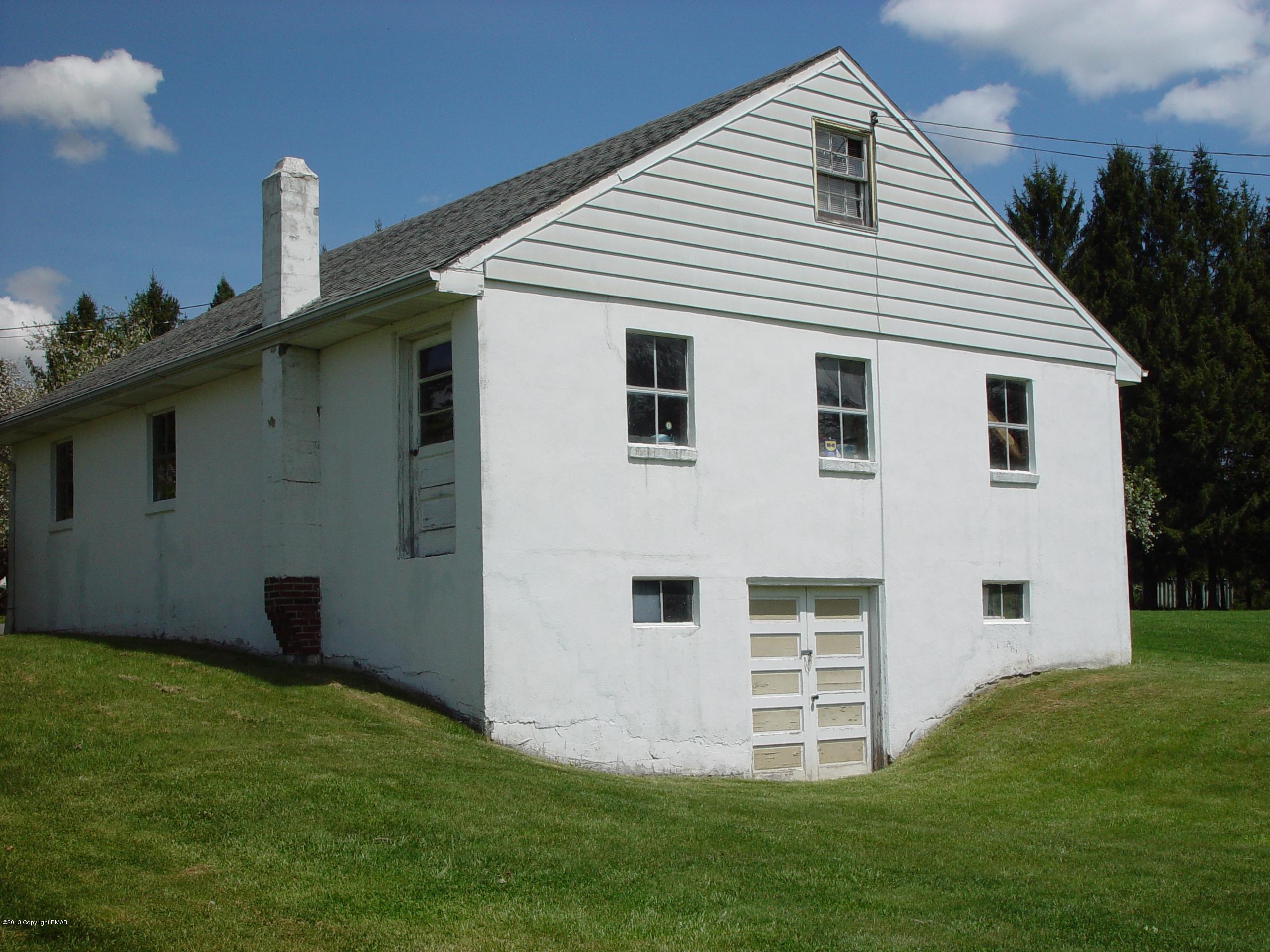 396 Good Times Road Kunkletown, PA 18058 - Photo 15 of 45 a front view of a house with a yard