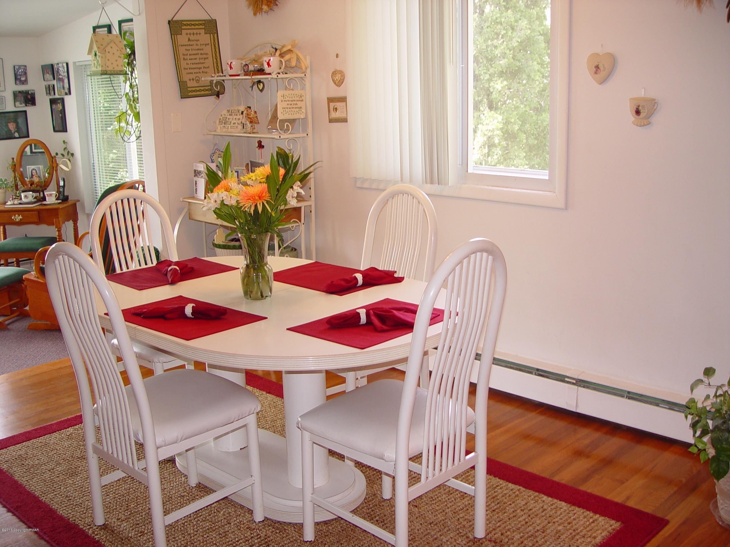 396 Good Times Road Kunkletown, PA 18058 - Photo 21 of 45 a view of a dining room with furniture and window