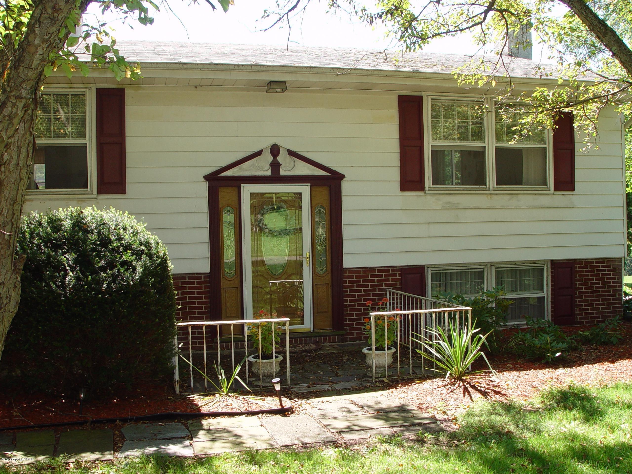 396 Good Times Road Kunkletown, PA 18058 - Photo 3 of 45 a front view of a house with a yard