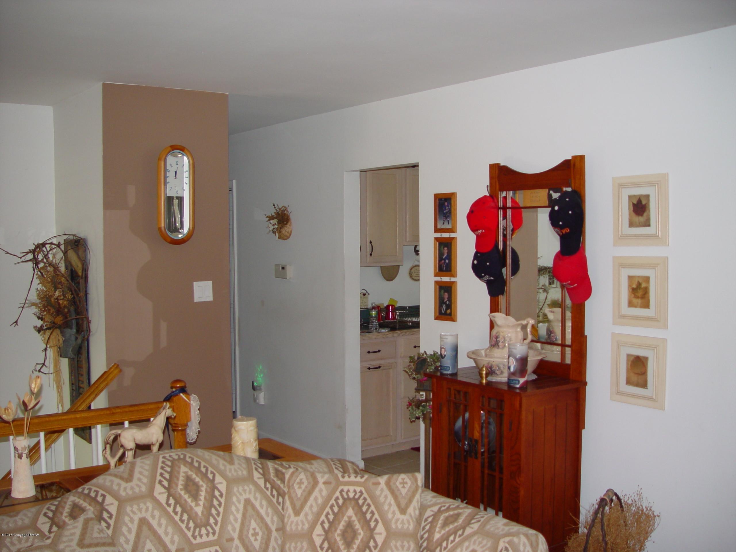 396 Good Times Road Kunkletown, PA 18058 - Photo 36 of 45 a bedroom with a bed and wooden floor