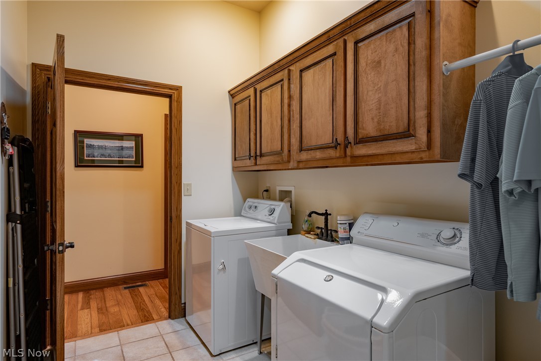 3908 River Road Vienna, WV 26105 - Photo 32 of 48 1st Floor Laundry is 7x9 and located between the side hall and the Master closet for added convenience