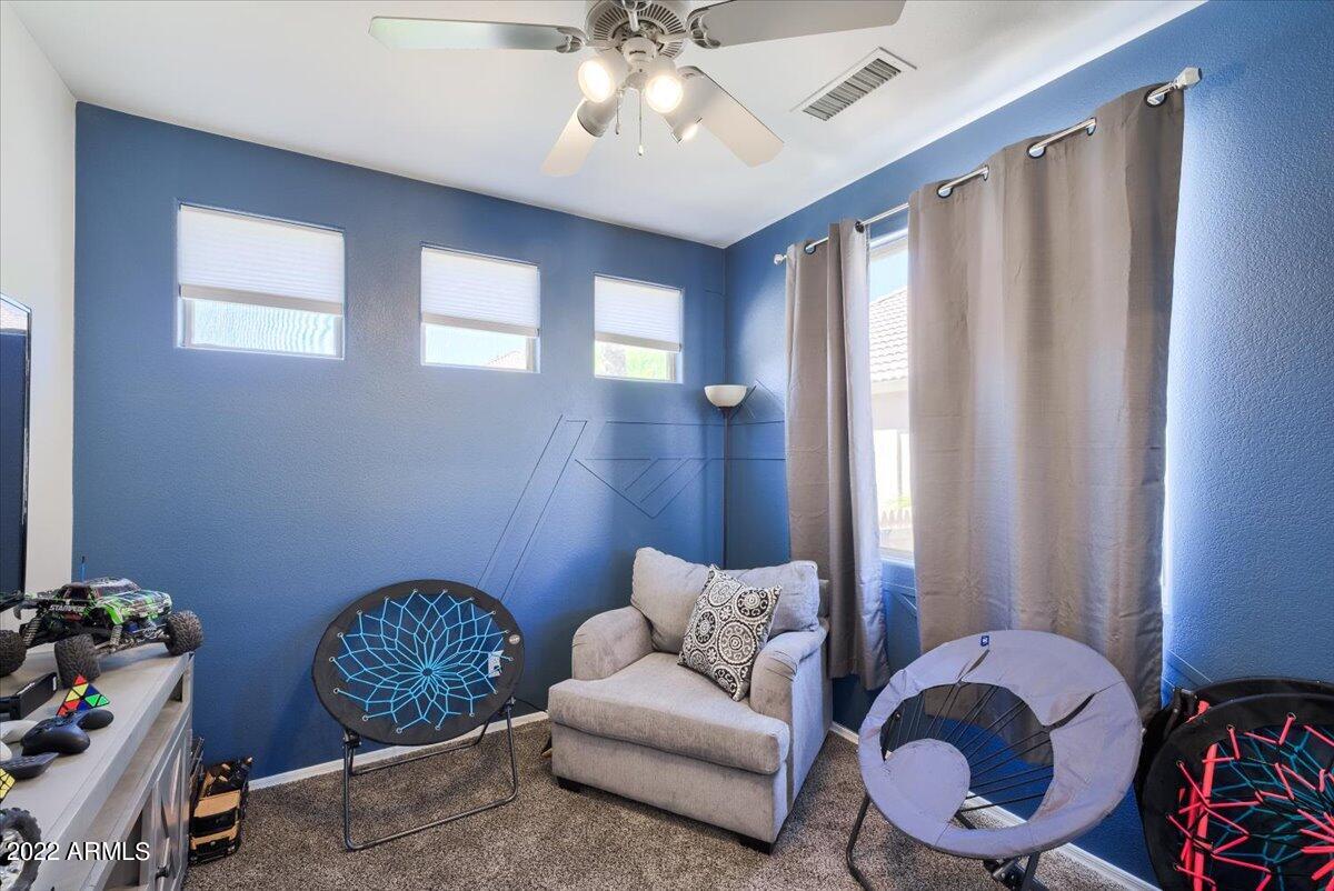3889 East Timberline Road Gilbert, AZ 85297 - Photo 16 of 25 a living room with furniture