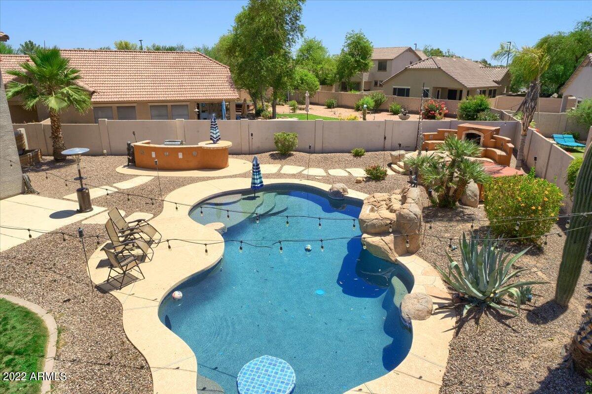 3889 East Timberline Road Gilbert, AZ 85297 - Photo 19 of 25 a view of a house with backyard