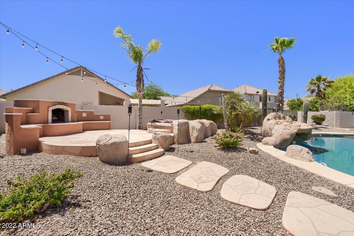 3889 East Timberline Road Gilbert, AZ 85297 - Photo 22 of 25 a front view of a house with patio