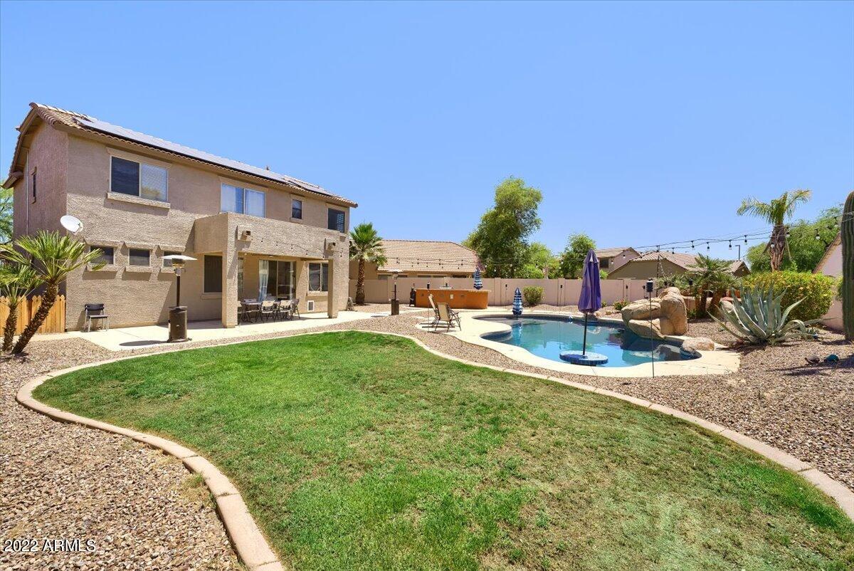 3889 East Timberline Road Gilbert, AZ 85297 - Photo 23 of 25 a view of a house with backyard porch and patio