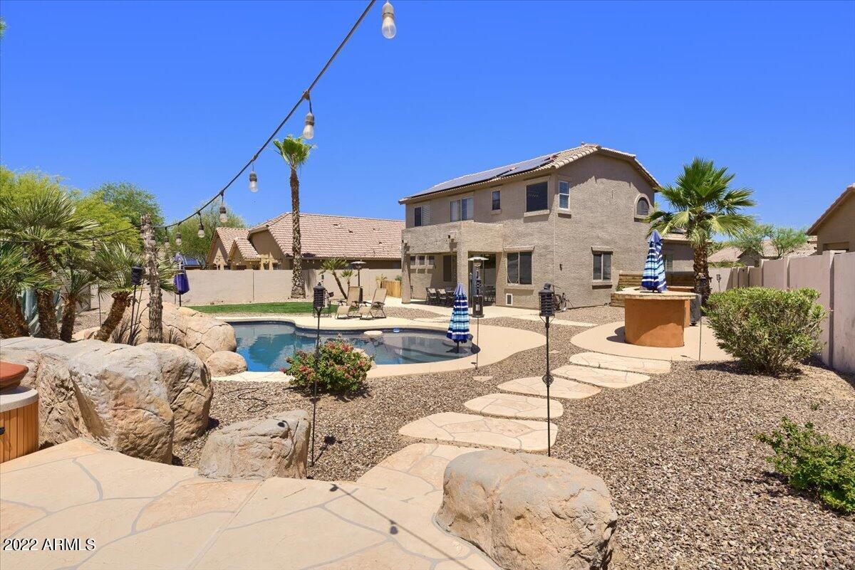 3889 East Timberline Road Gilbert, AZ 85297 - Photo 24 of 25 a view of a backyard with a patio