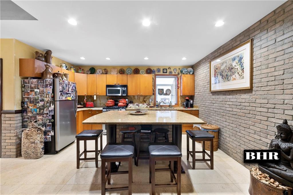 179 Norfolk Street Brooklyn, NY 11235 - Photo 6 of 31 a view of a dining room with furniture