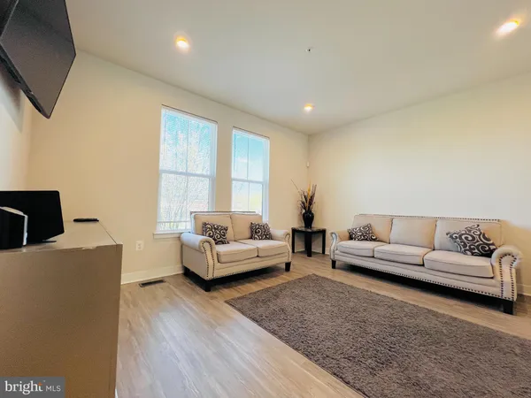 a living room with furniture and a couch