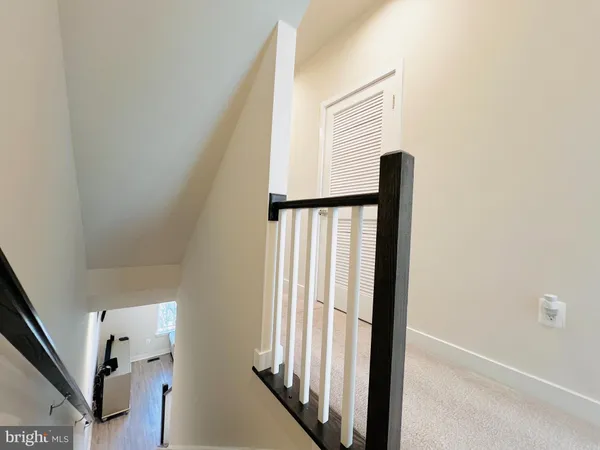 a view of a hallway with windows