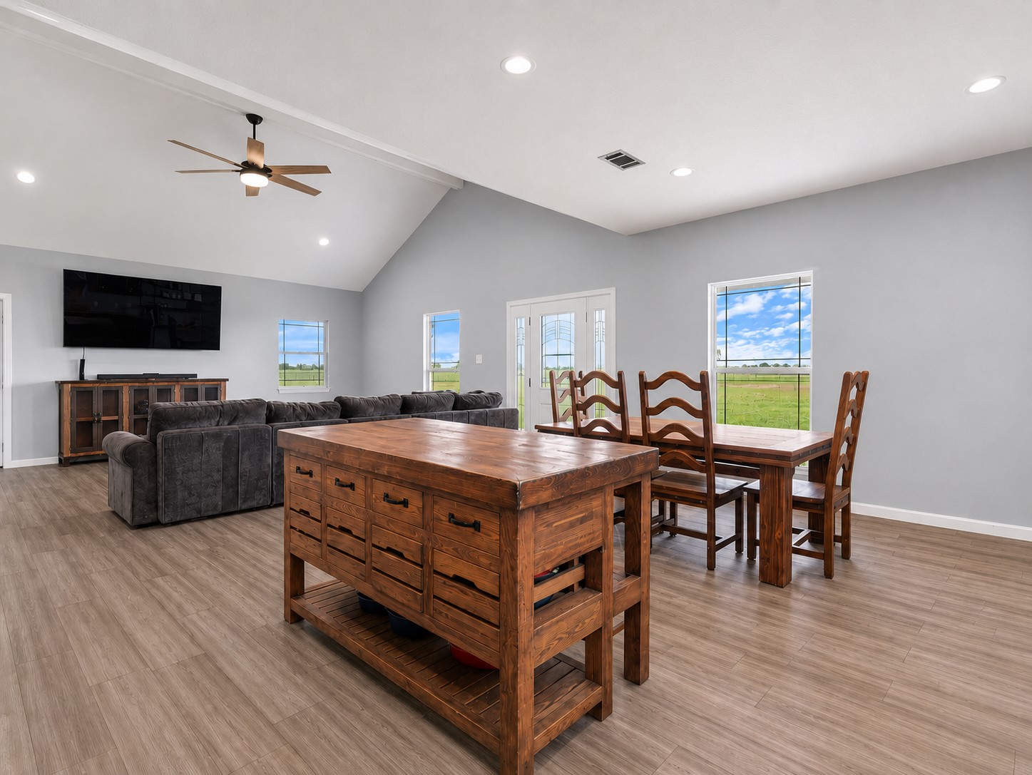 11301 South FM 441 Road El Campo, TX 77437 - Photo 9 of 32 Guests can sit and chat at the breakfast bar while entertaining.