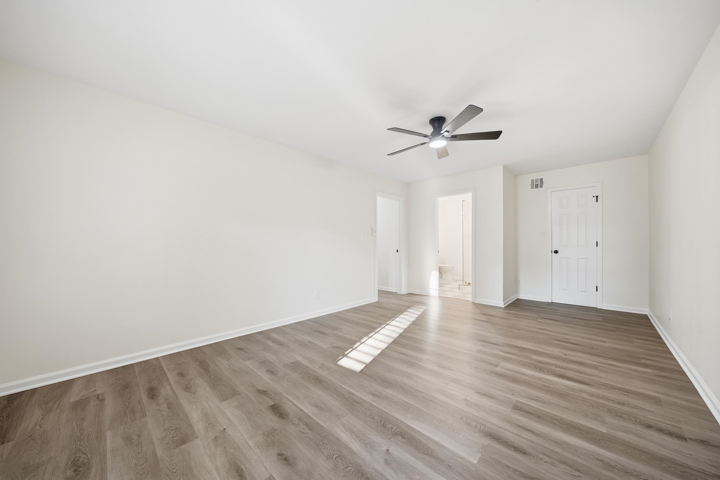 6246 Quince Road Memphis, TN 38119 - Photo 15 of 27 wooden floor in an empty room