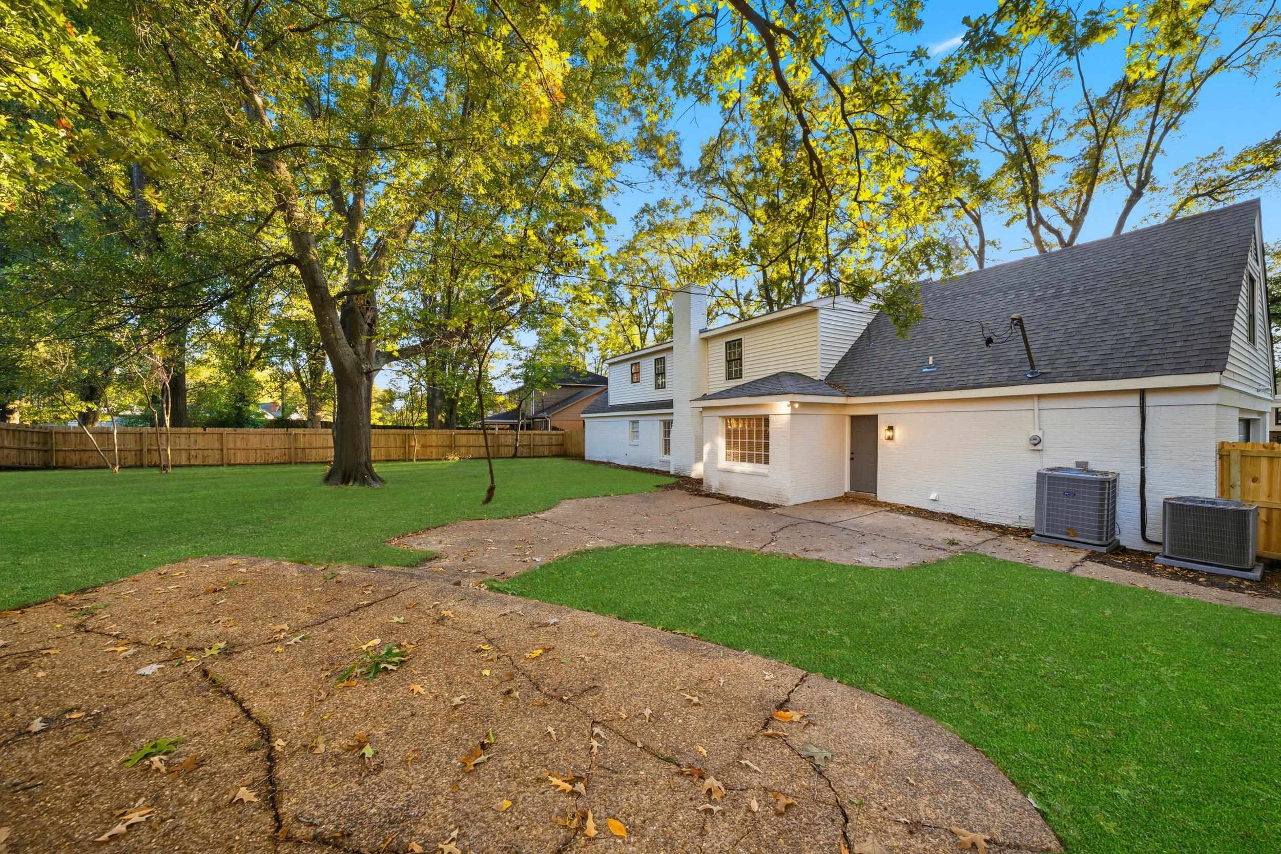 6246 Quince Road Memphis, TN 38119 - Photo 26 of 27 a view of a house with a yard
