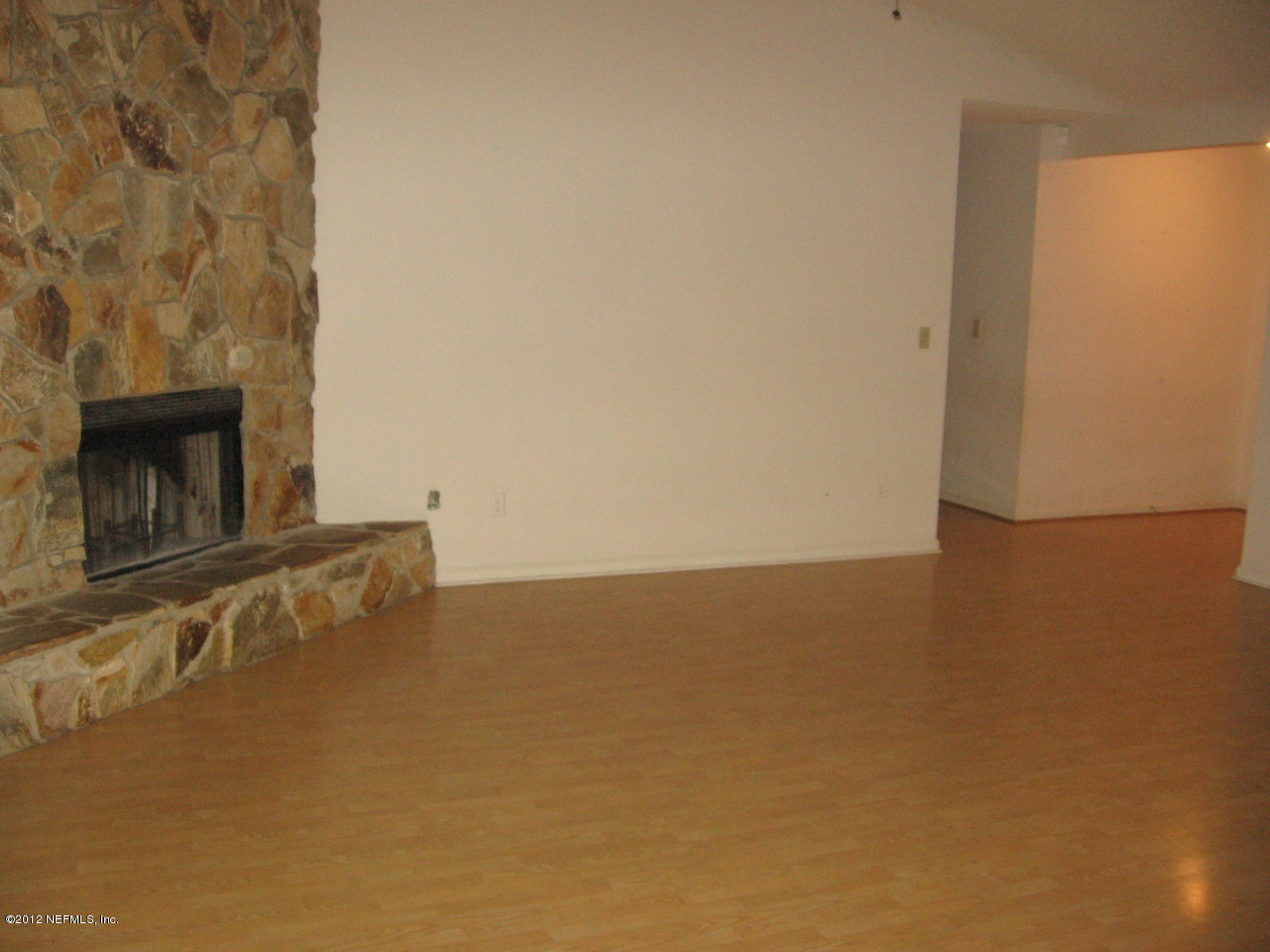 1952 Rothbury Drive Jacksonville, FL 32221 - Photo 6 of 9 a view of an empty room with a fireplace