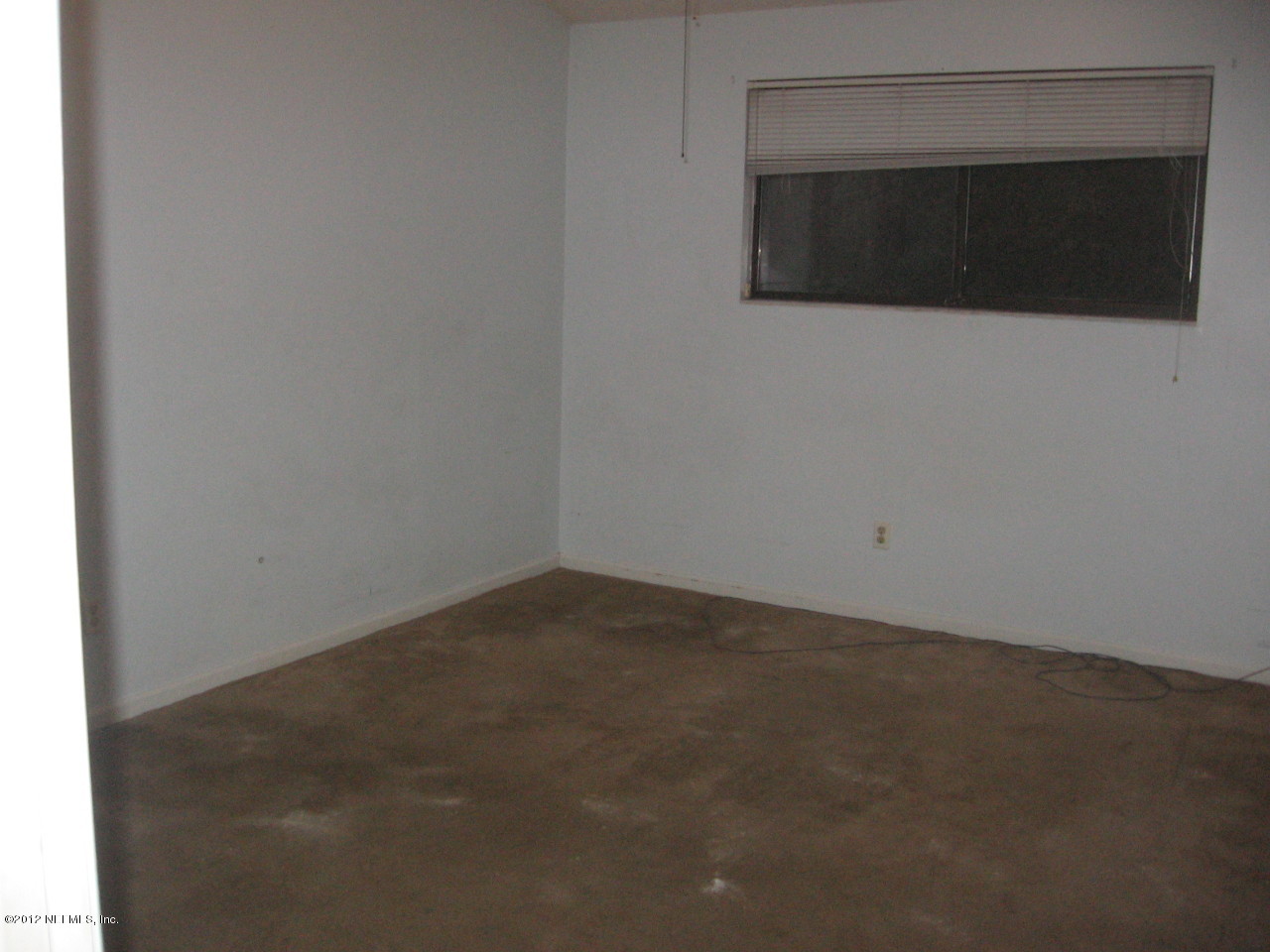1952 Rothbury Drive Jacksonville, FL 32221 - Photo 8 of 9 a view of a livingroom with an empty space