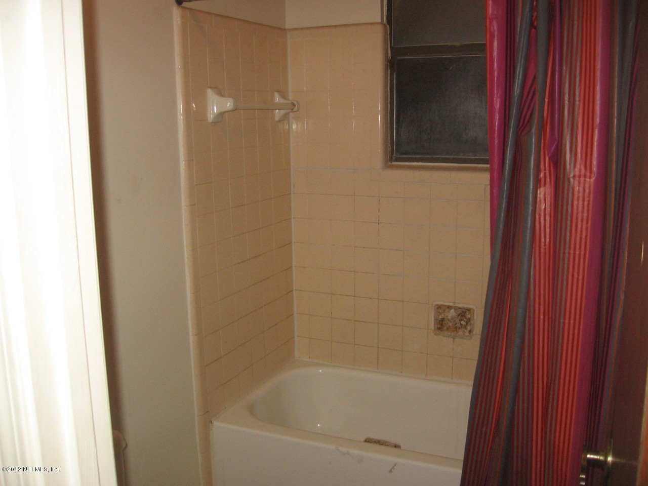 1952 Rothbury Drive Jacksonville, FL 32221 - Photo 9 of 9 a close up of a bathtub curtain