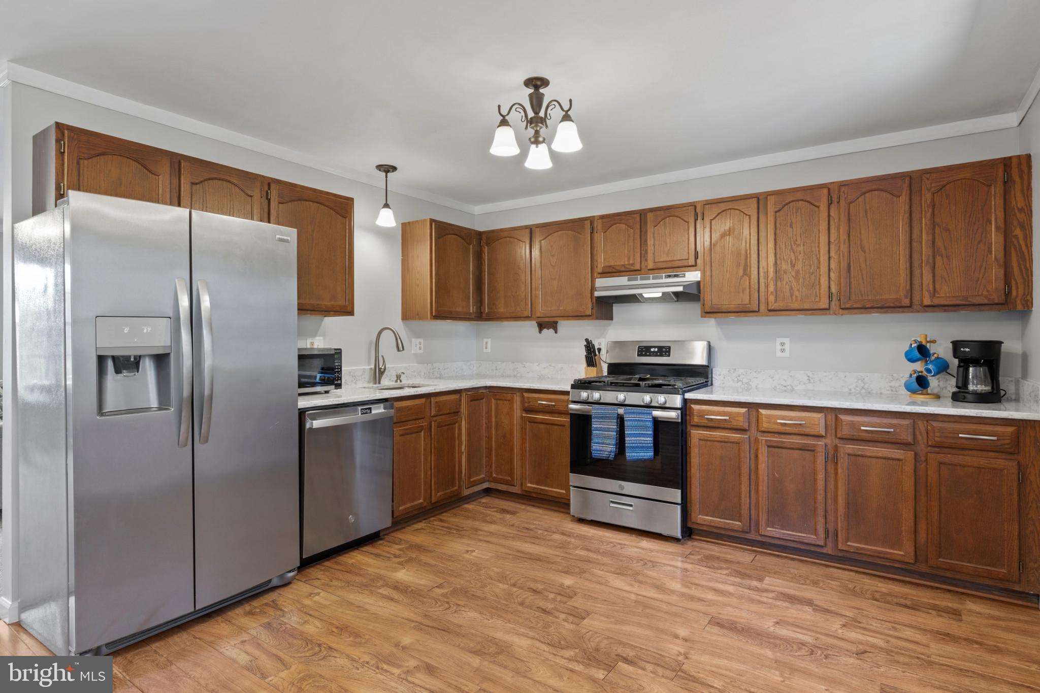 3838 Dakota Road Hampstead, MD 21074 - Photo 9 of 31 Quartz countertops & stainless steel appliances