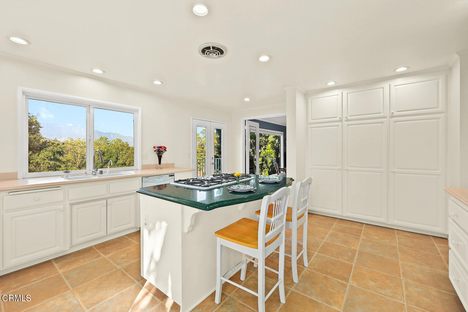 100 Sequoia Drive Pasadena, CA 91105 - Photo 13 of 51 a kitchen with stainless steel appliances granite countertop a stove a sink and a refrigerator