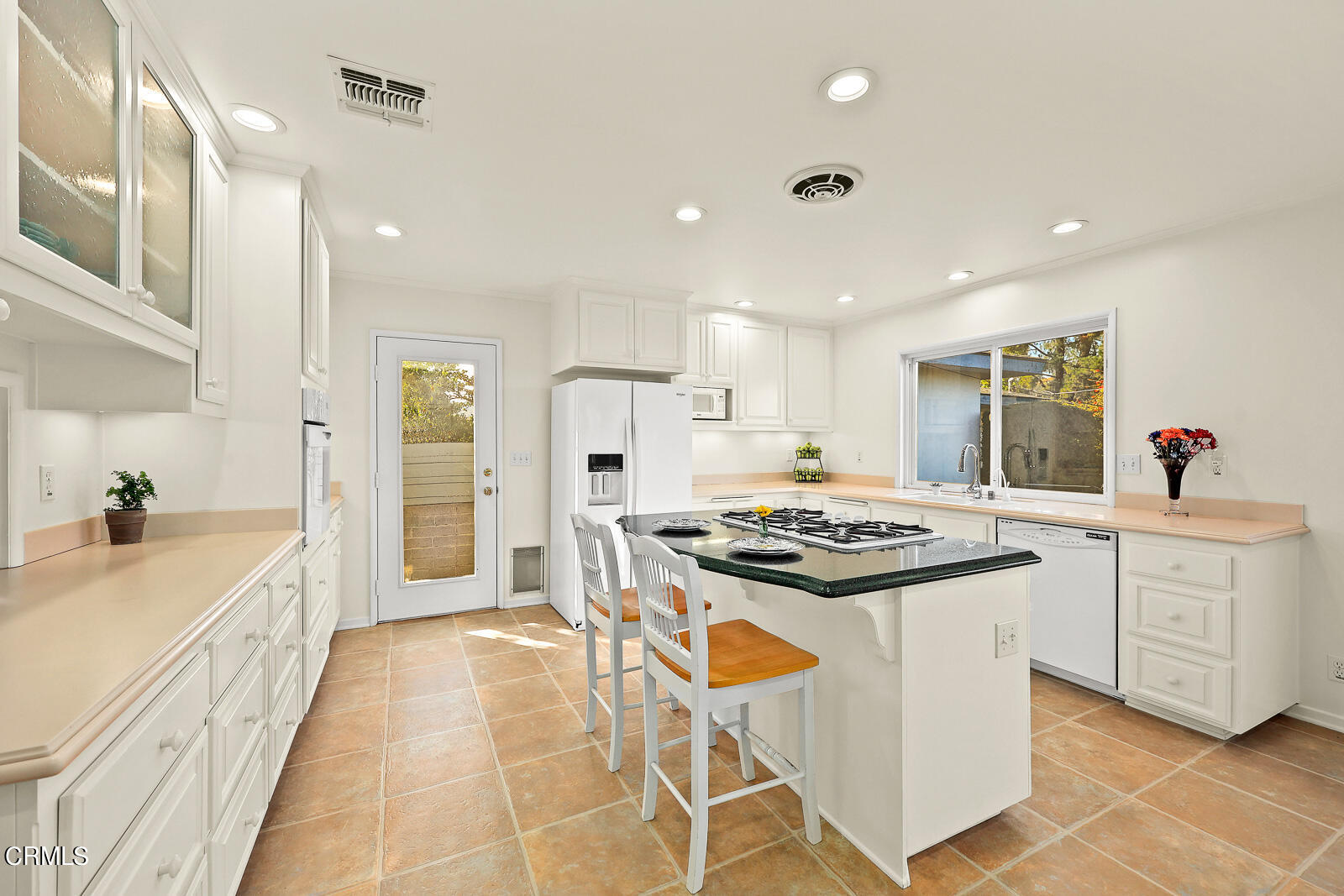 100 Sequoia Drive Pasadena, CA 91105 - Photo 14 of 51 a kitchen with stainless steel appliances granite countertop a stove and a sink