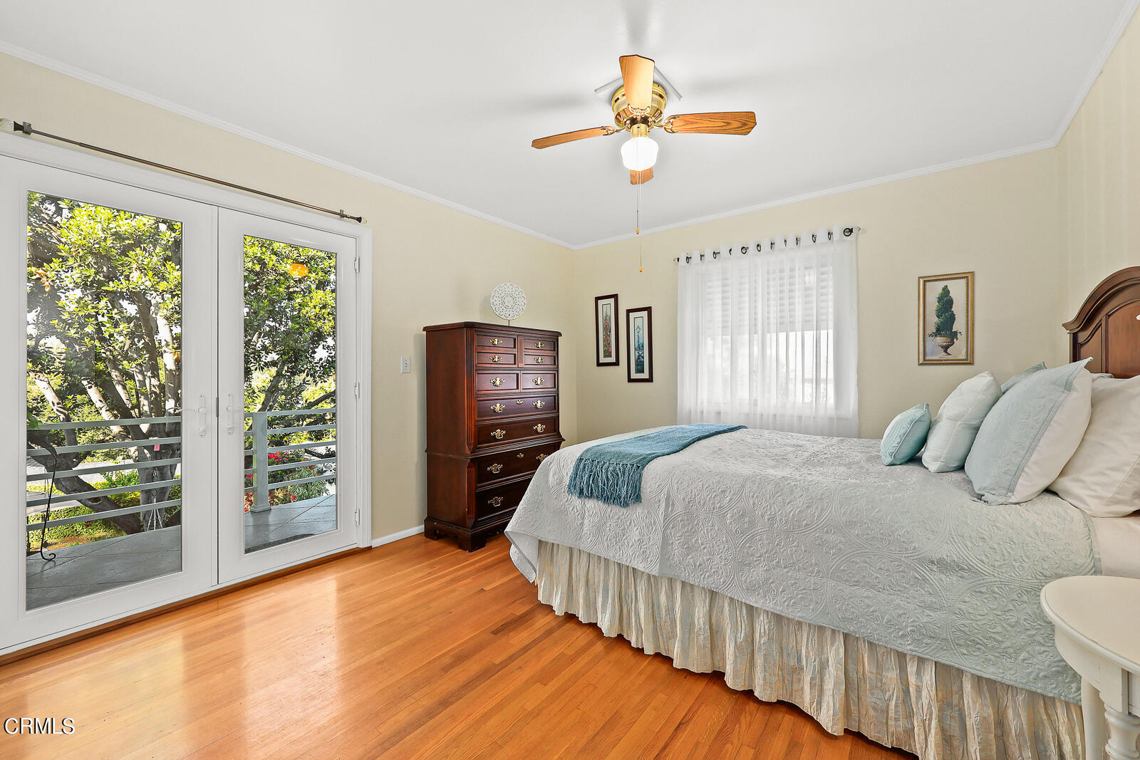 100 Sequoia Drive Pasadena, CA 91105 - Photo 21 of 51 a bedroom with a large bed and a chandelier