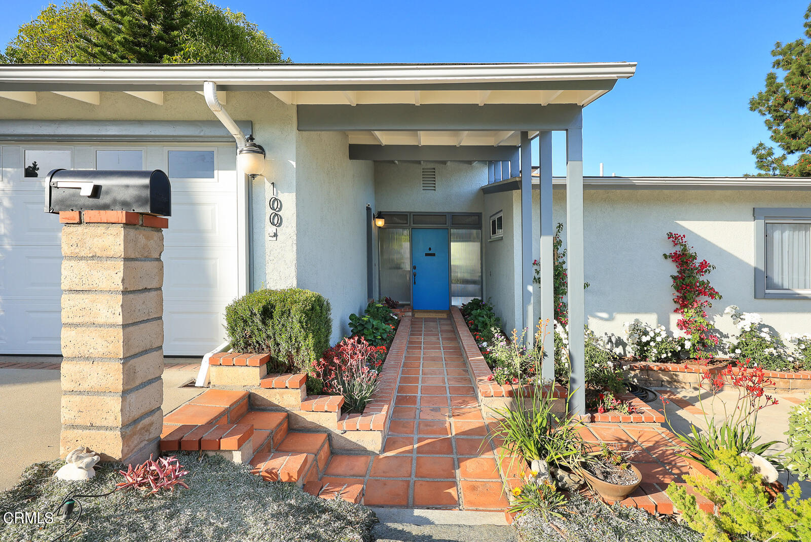 100 Sequoia Drive Pasadena, CA 91105 - Photo 3 of 51 a front view of a house with outdoor seating
