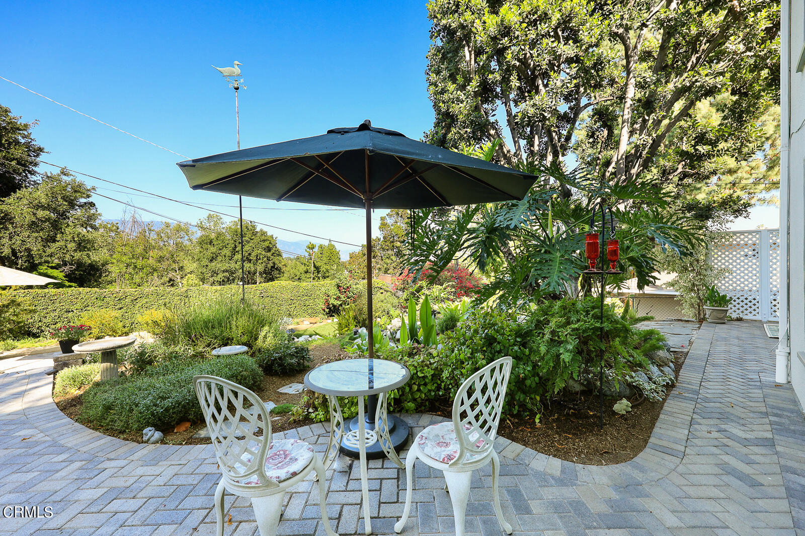 100 Sequoia Drive Pasadena, CA 91105 - Photo 33 of 51 a view of table and chairs under an umbrella