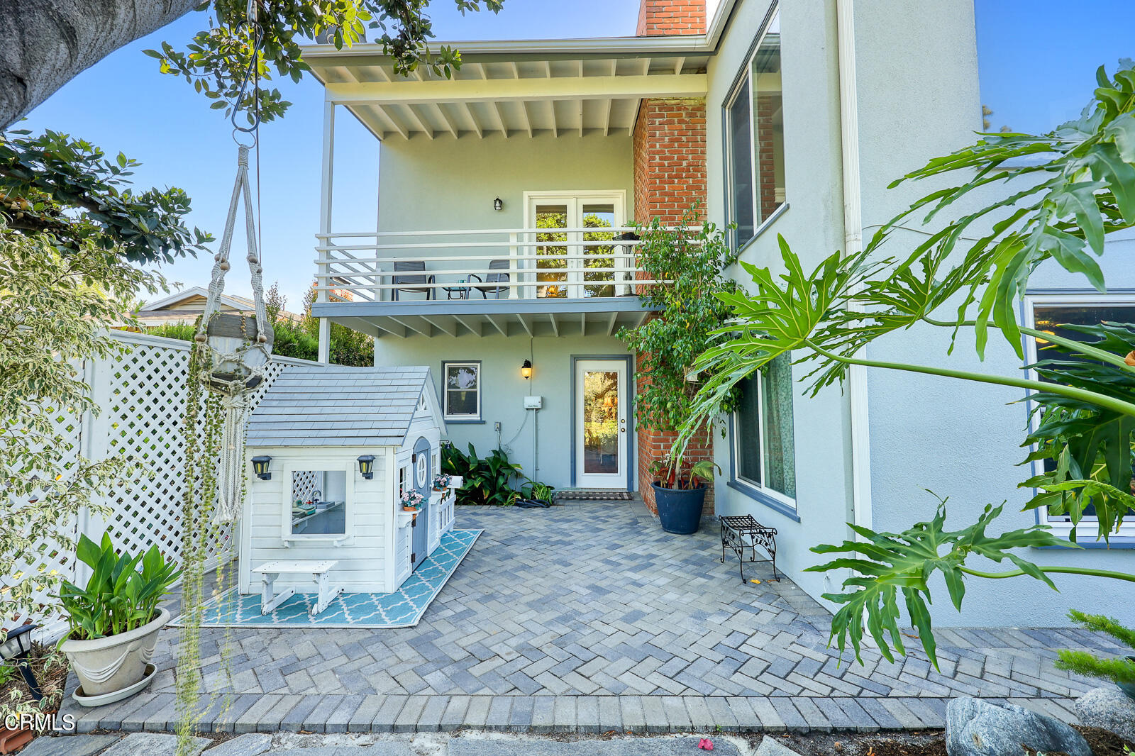 100 Sequoia Drive Pasadena, CA 91105 - Photo 35 of 51 a front view of a house with a garden