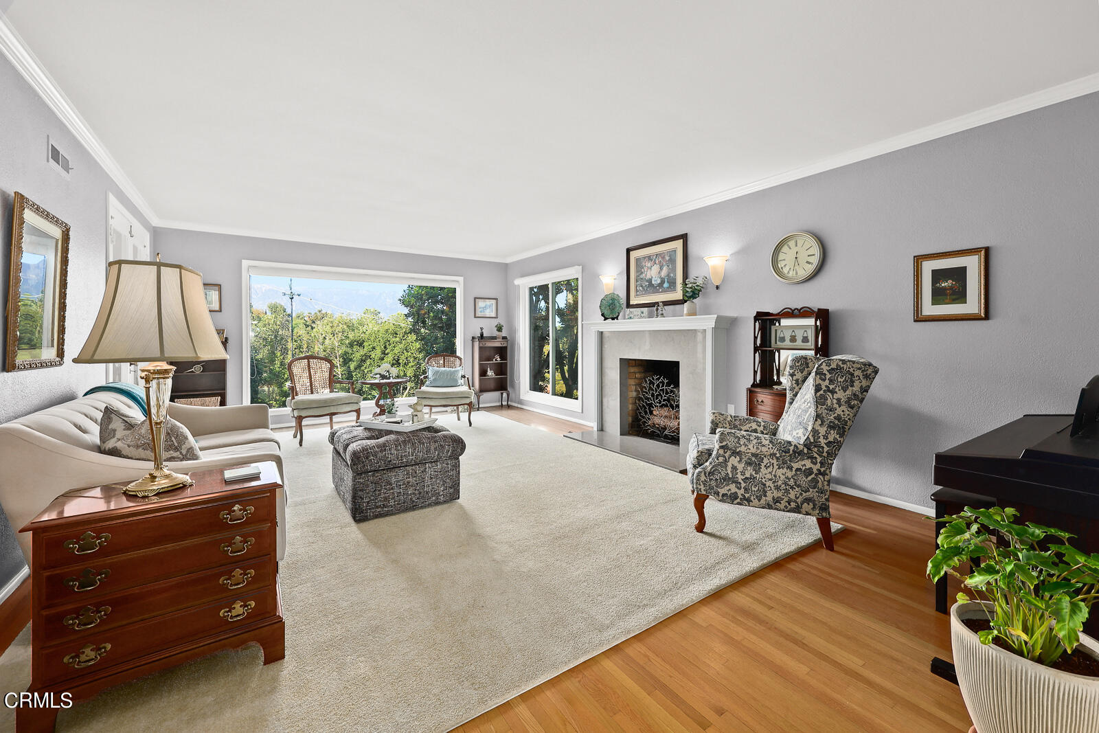 100 Sequoia Drive Pasadena, CA 91105 - Photo 6 of 51 a living room with furniture and a fireplace