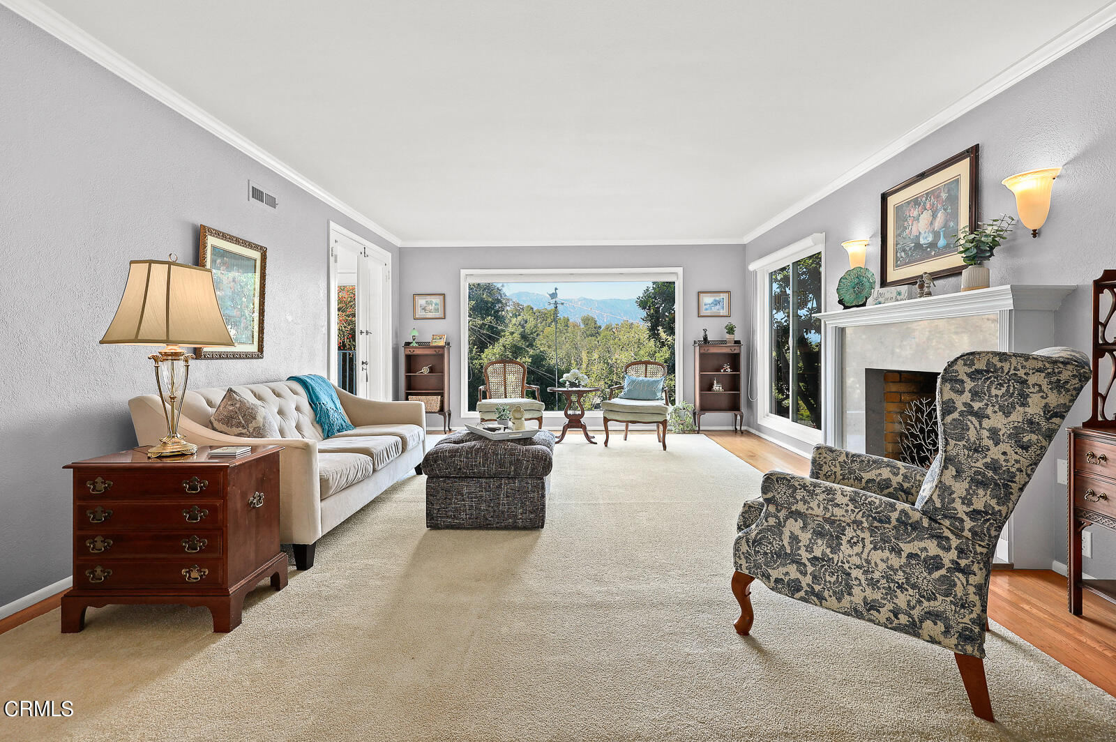 100 Sequoia Drive Pasadena, CA 91105 - Photo 7 of 51 a living room with furniture fireplace and a large window