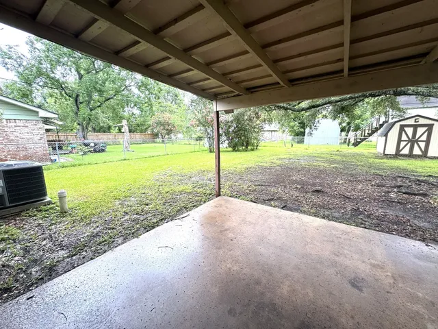 a view of backyard with green space