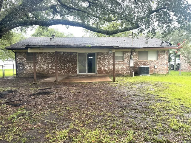 a view of hallway with wooden floor