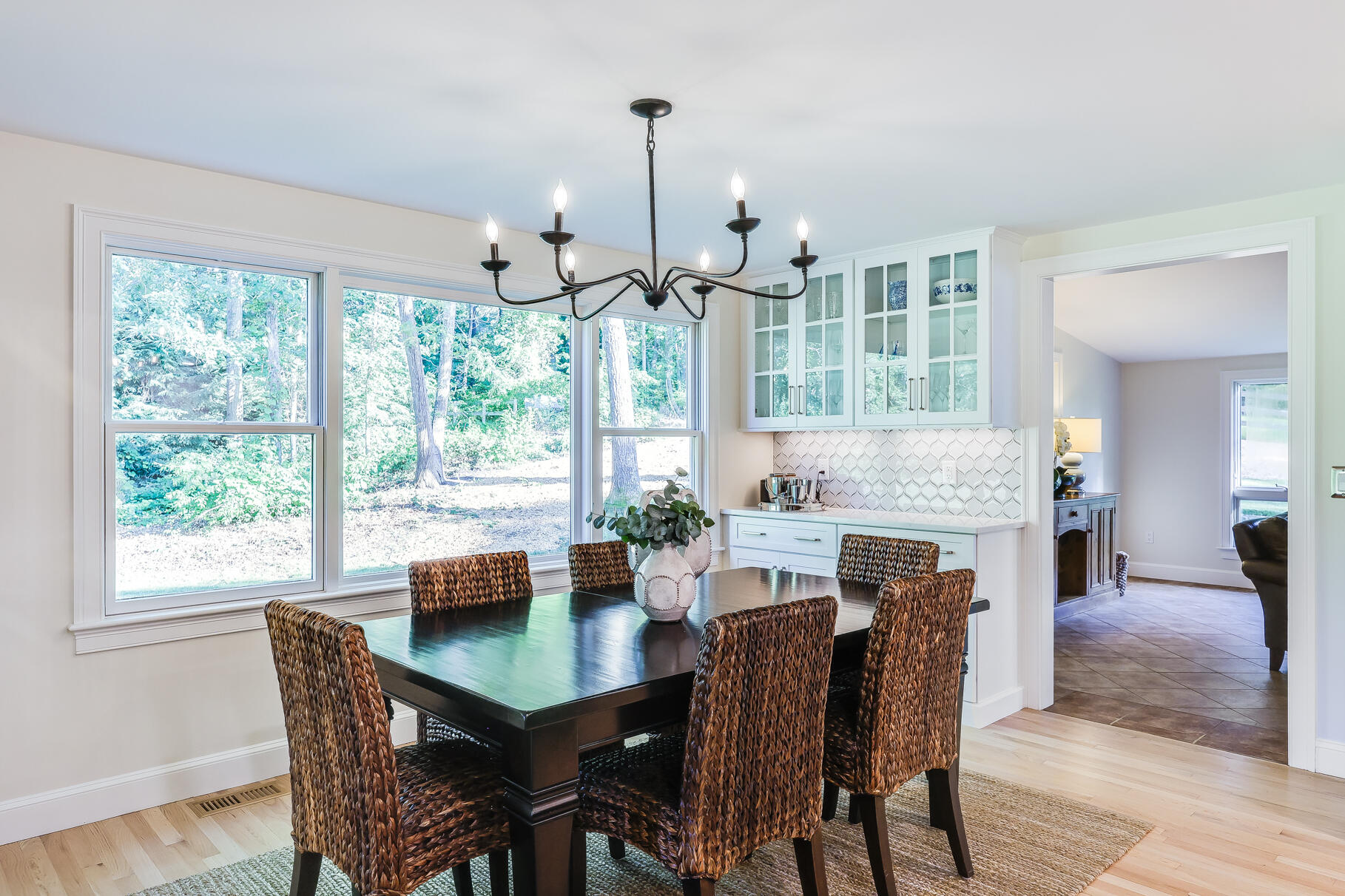 125 Service Road East Sandwich, MA 02537 - Photo 25 of 87 a dining room with furniture window fireplace and wooden floor