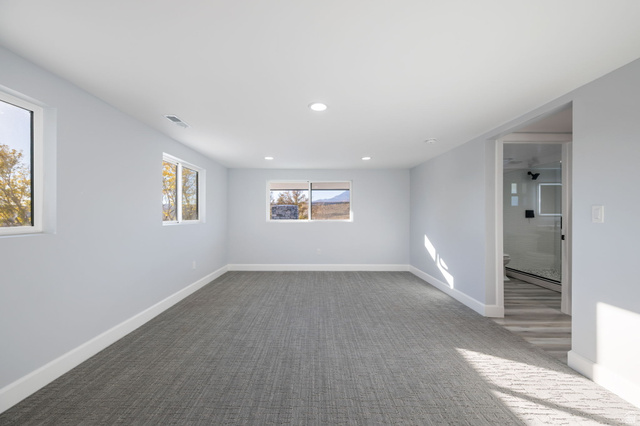 476 Spring Drive Toquerville, UT 84774 - Photo 57 of 95 Carpeted spare room featuring baseboards and recessed lighting