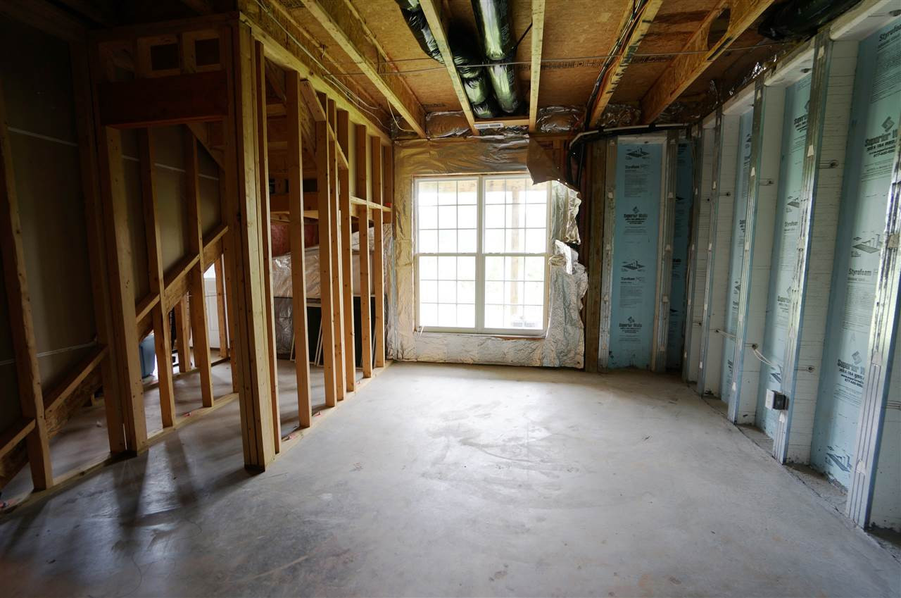 7730 San Gabriel Street Raleigh, NC 27613 - Photo 25 of 25 Basement has exterior entrance & lots of potential. Unfinished Basement