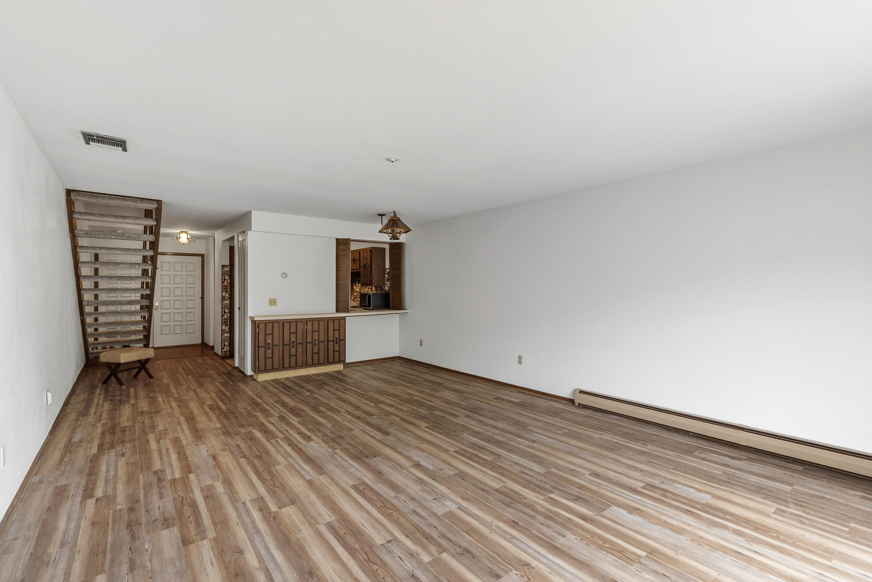 4155 West Rivers Edge Circle, Unit 4 Brown Deer, WI 53209 - Photo 3 of 18 Brand new vinyl plank flooring.