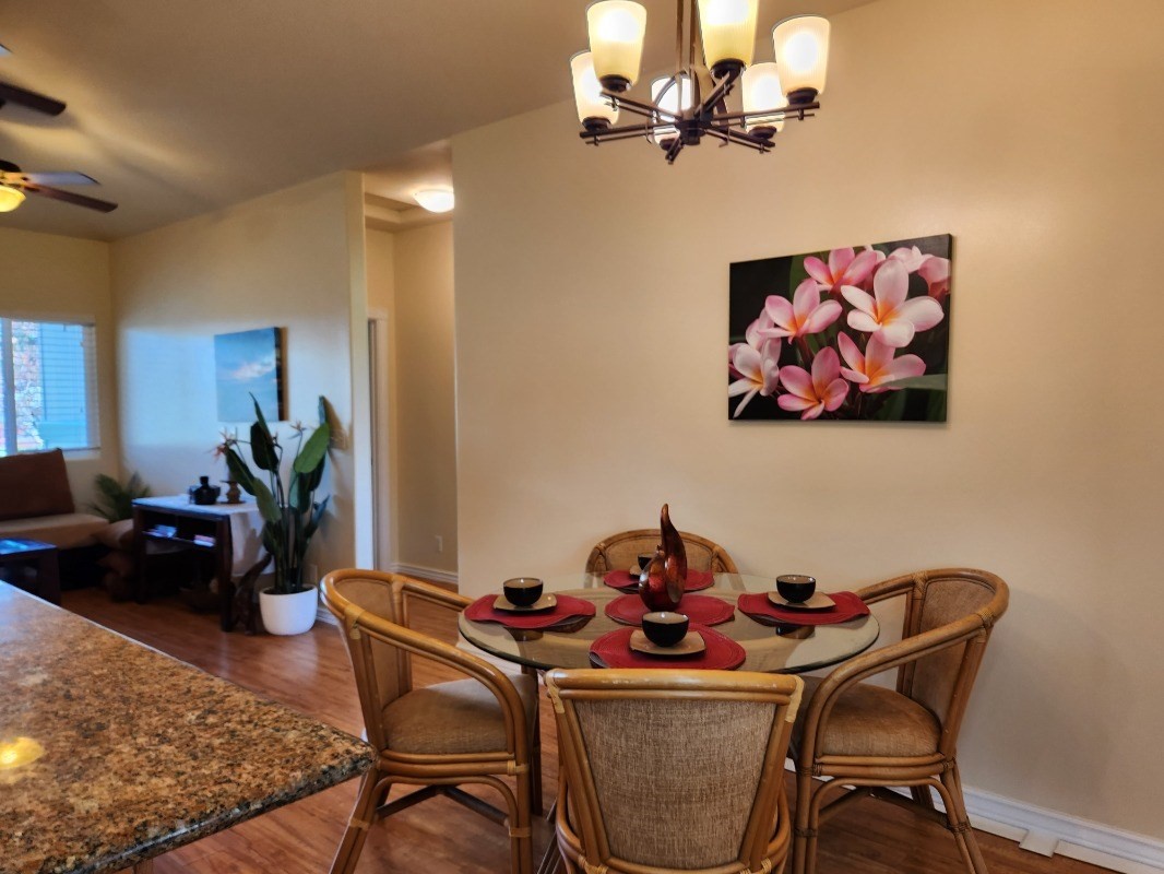1507 Haleloke Street Hilo, HI 96720 - Photo 14 of 21 a view of a dining room with furniture and wooden floor