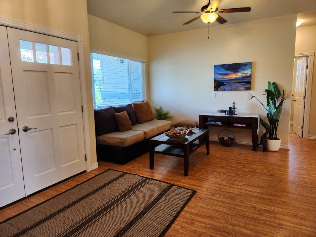 1507 Haleloke Street Hilo, HI 96720 - Photo 15 of 21 a living room with furniture and a wooden floor
