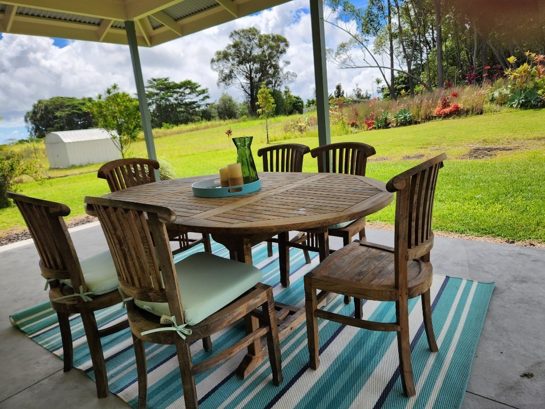 1507 Haleloke Street Hilo, HI 96720 - Photo 20 of 21 a view of a chairs and table in patio with a yard