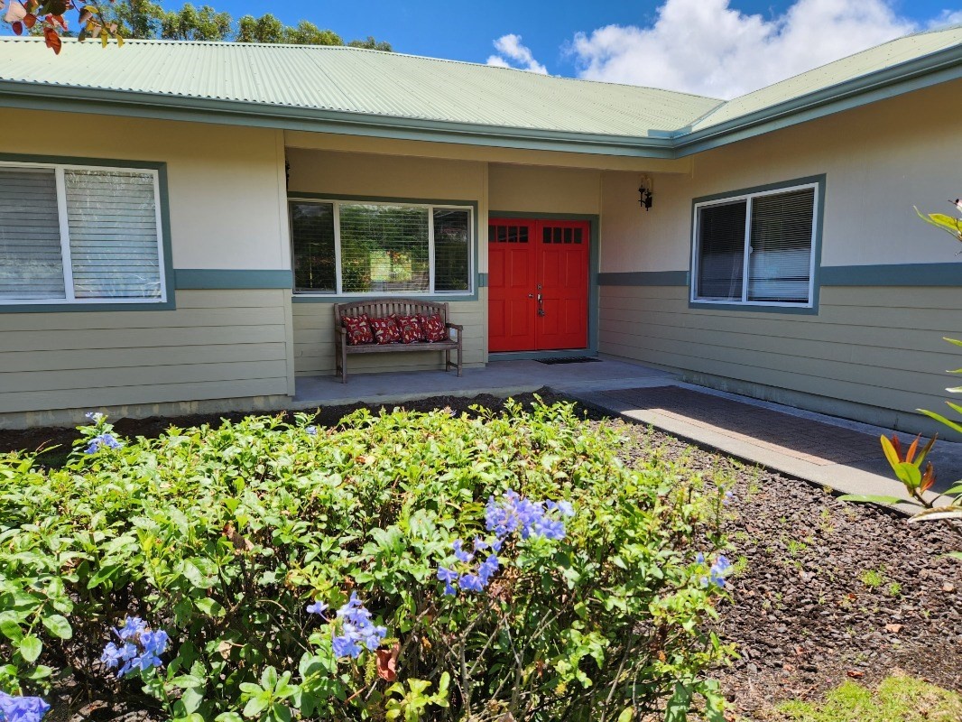1507 Haleloke Street Hilo, HI 96720 - Photo 2 of 21 a view of a house with a small yard