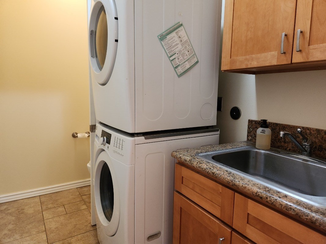 1507 Haleloke Street Hilo, HI 96720 - Photo 21 of 21 a utility room with dryer and washer
