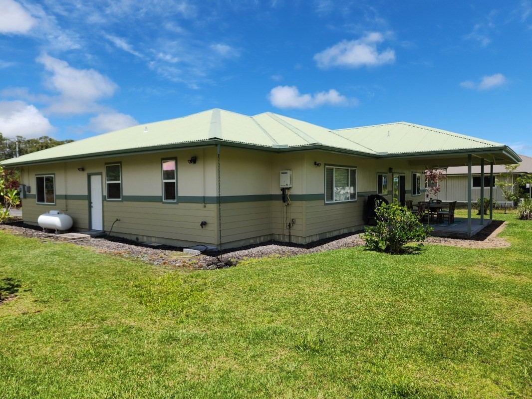 1507 Haleloke Street Hilo, HI 96720 - Photo 4 of 21 a front view of a house with garden