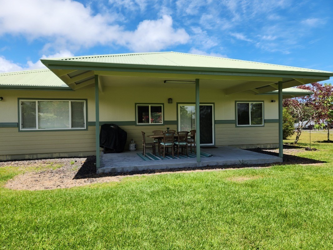 1507 Haleloke Street Hilo, HI 96720 - Photo 5 of 21 a front view of a house with patio and garden