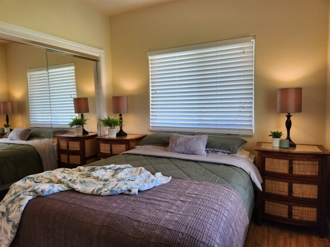 1507 Haleloke Street Hilo, HI 96720 - Photo 7 of 21 a bedroom with a bed and a window